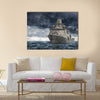 The military ship on sea against heavy clouds Multi Panel Canvas Wall Art