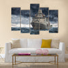 The military ship on sea against heavy clouds Multi Panel Canvas Wall Art