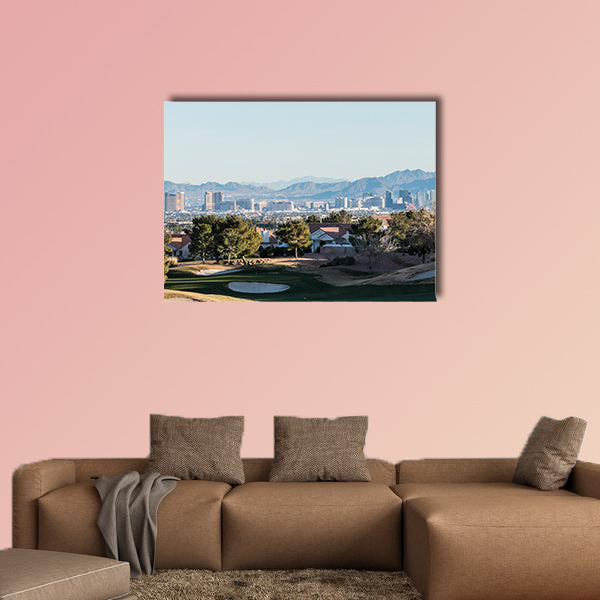 Clear winter sky above golf course homes and casino resort towers wall art