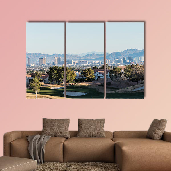 Clear winter sky above golf course homes and casino resort towers wall art