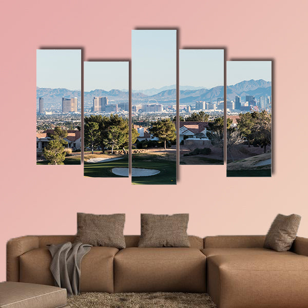 Clear winter sky above golf course homes and casino resort towers wall art