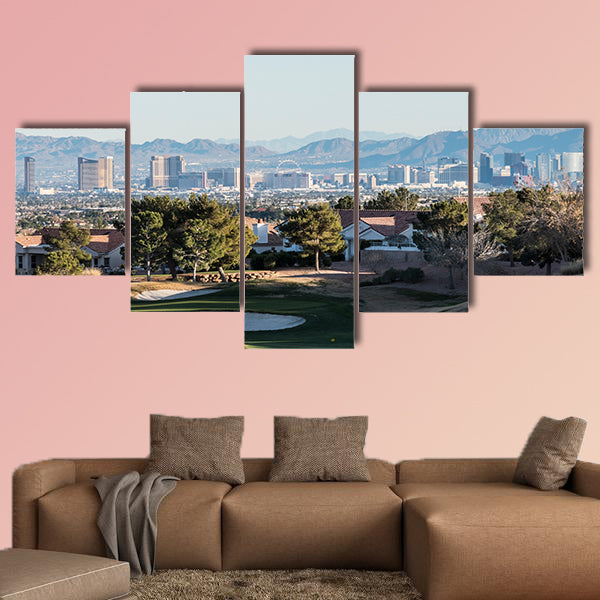 Clear winter sky above golf course homes and casino resort towers wall art