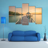 Wooden pier between sunset in Phuket, Thailand multi panel canvas wall art