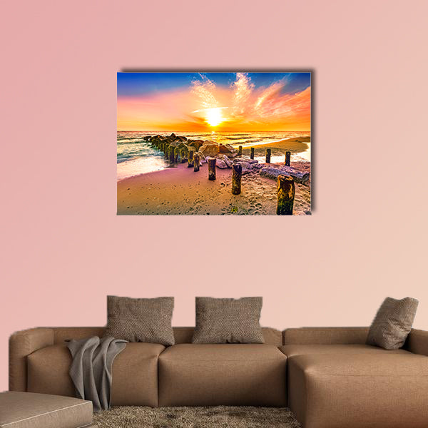 Colorful sunset on a beach multi panel canvas wall art