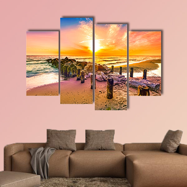 Colorful sunset on a beach multi panel canvas wall art