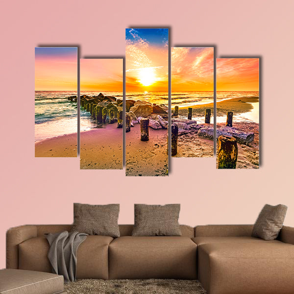 Colorful sunset on a beach multi panel canvas wall art