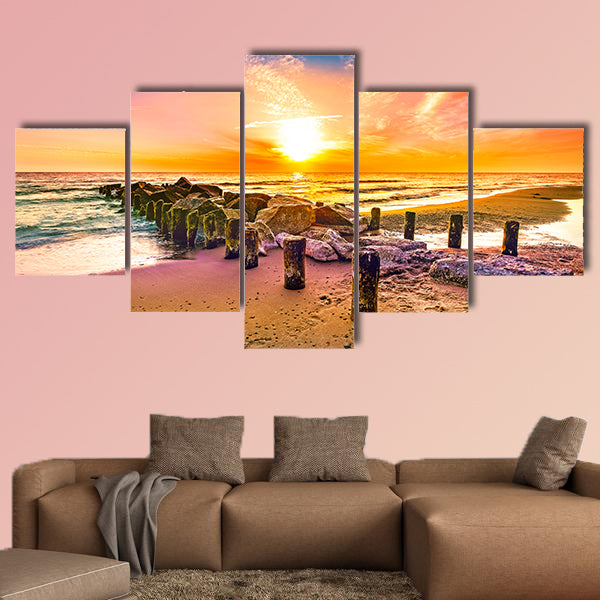 Colorful sunset on a beach multi panel canvas wall art