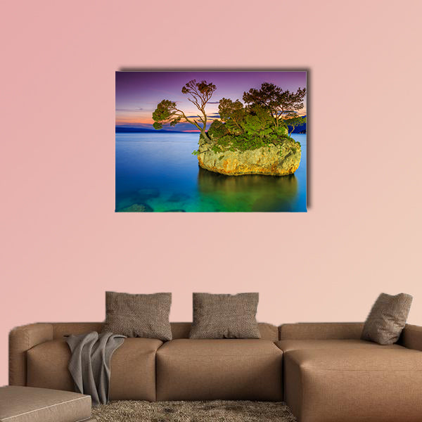Stunning sunset landscape with rocky island multi panel canvas wall art