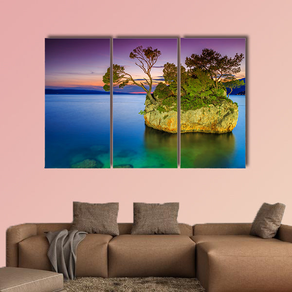 Stunning sunset landscape with rocky island multi panel canvas wall art
