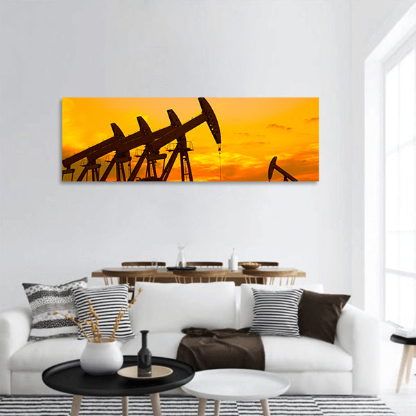 Oil Pump on orange sunset panoramic canvas wall art