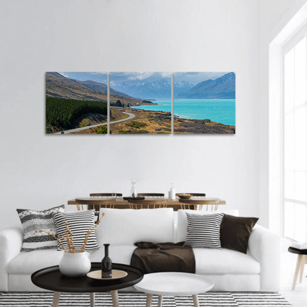 Panoramic image of asphalt road along Lake Pukaki Panoramic Canvas Wall Art
