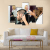 Professional Hairdresser is Making a Haircut with Scissors and a Comb for a Male Customer Multi Panel Canvas Wall Art