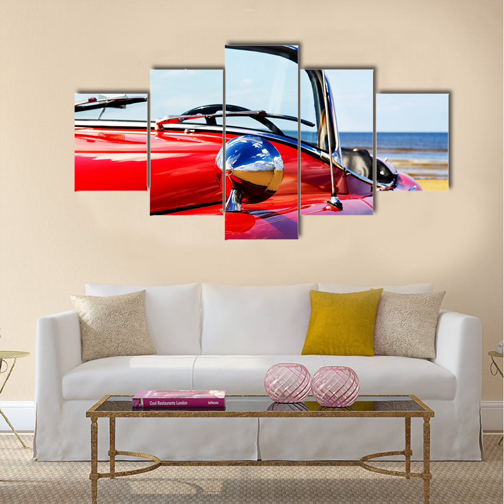 Old classic red car at beach Multi panel canvas wall art