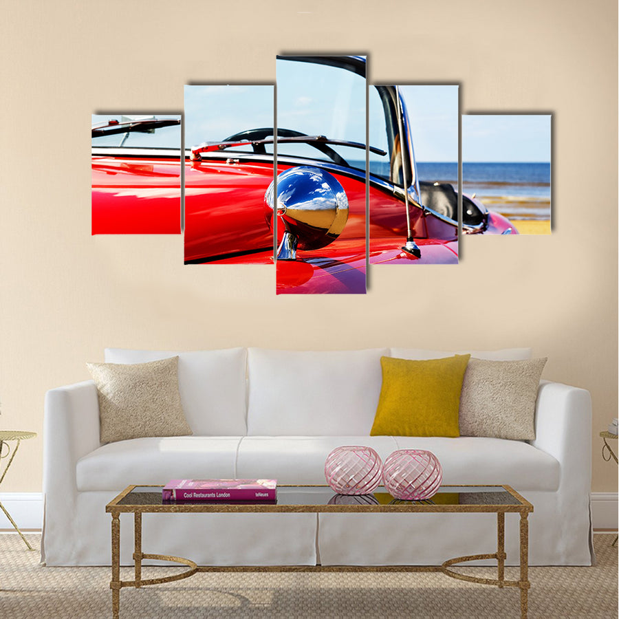 Old classic red car at beach Multi panel canvas wall art