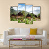 A traditional hut in an Indonesian mountain village Multi panel canvas wall art