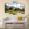 A traditional hut in an Indonesian mountain village Multi panel canvas wall art