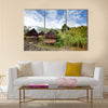 A traditional mountain village in Papua, Indonesia Multi panel canvas wall art