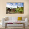 A traditional mountain village in Papua, Indonesia Multi panel canvas wall art