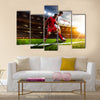 Soccer players in action on sunset stadium background panorama Multi Panel Canvas Art