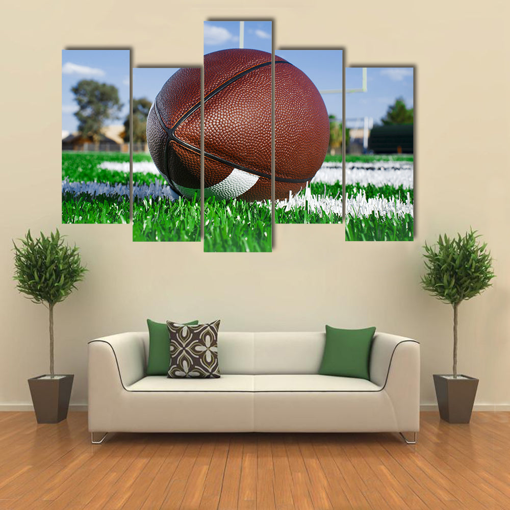 American football on find with goal posts Multi panel canvas wall art
