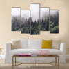 Forested mountain slope in low lying cloud  multi panel canvas wall art