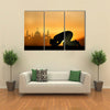 A Muslim Bowing Down In Front Of God Praying At Sunset Multi Panel Canvas Wall Art