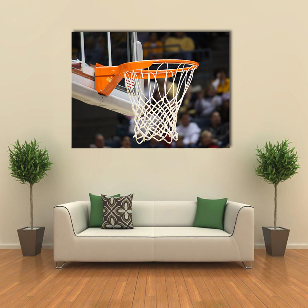 Basketball rim in focus with a glass backboard Multi panel canvas wall art