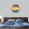 Sunrise and shining waves in ocean hexagonal canvas wall art