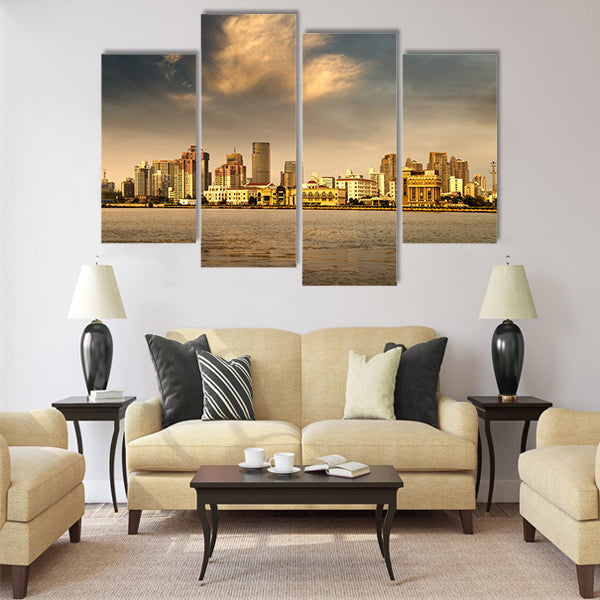City in the setting sun Multi Panel Canvas Wall Art