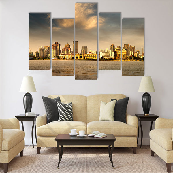 City in the setting sun Multi Panel Canvas Wall Art