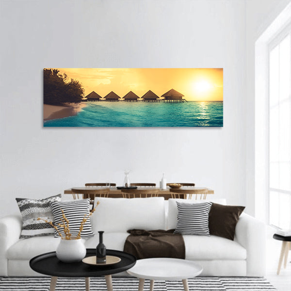Water bungalows into amazing green lagoon panoramic canvas wall art