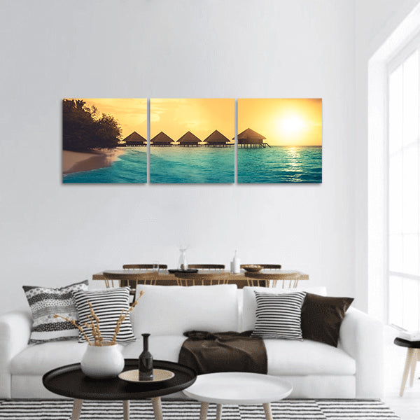 Water bungalows into amazing green lagoon panoramic canvas wall art