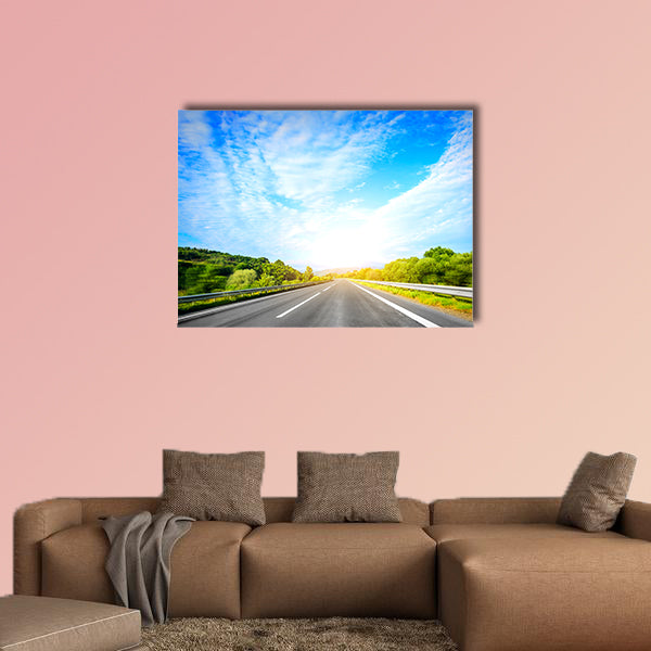 Highway outside the city at sunset multi panel canvas wall art
