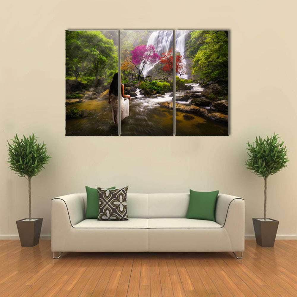 Young asian woman standing by a stream in the dreamy forest multi panel canvas wall art