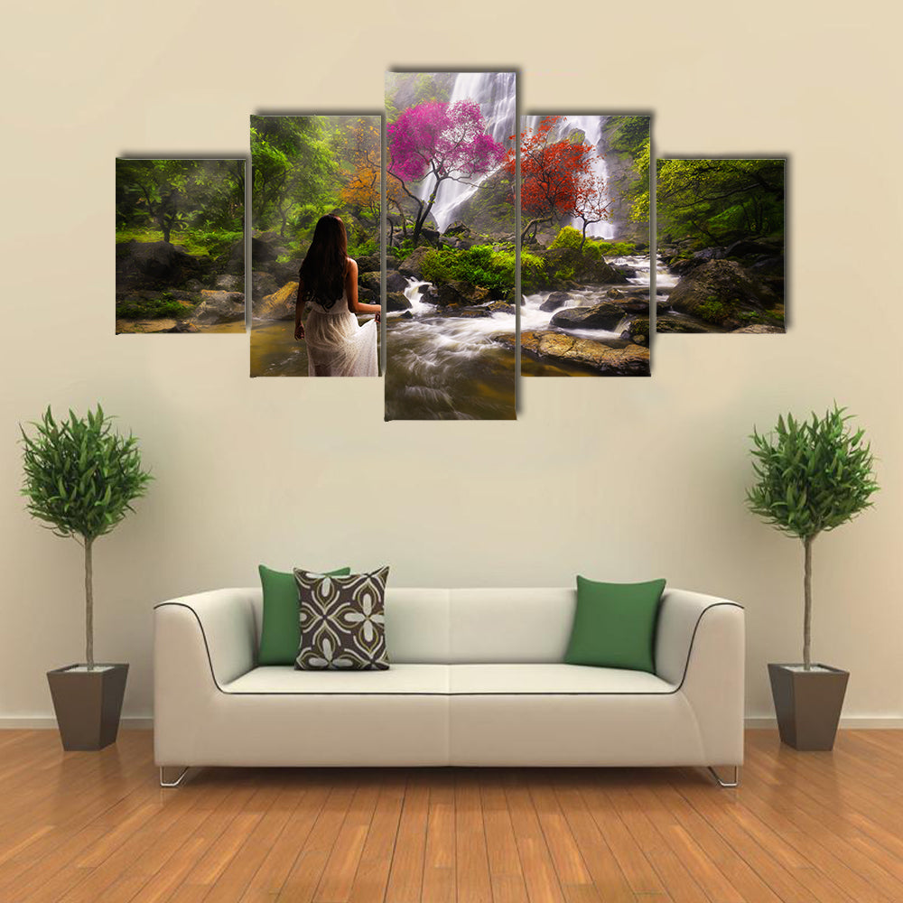 Young asian woman standing by a stream in the dreamy forest multi panel canvas wall art