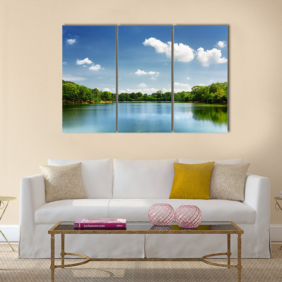 Beautiful lake nestled among rainforest in Cambodia multi panel canvas wall art