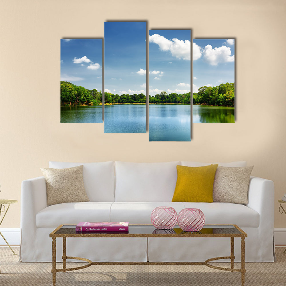 Beautiful lake nestled among rainforest in Cambodia multi panel canvas wall art