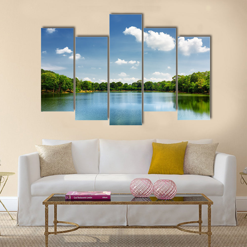 Beautiful lake nestled among rainforest in Cambodia multi panel canvas wall art