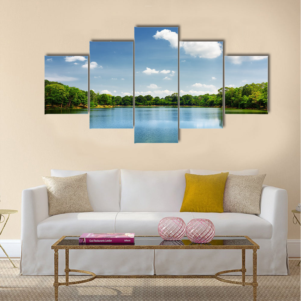 Beautiful lake nestled among rainforest in Cambodia multi panel canvas wall art