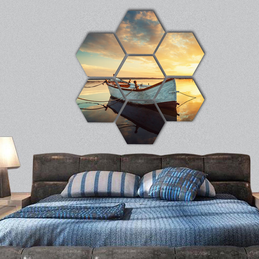 Boat on lake with a reflection in the water at sunset hexagonal canvas wall art