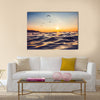 Sunrise light shining on ocean wave Multi Panel Canvas Wall Art