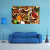 Various herbs and spices on wooden table Multi panel canvas wall art