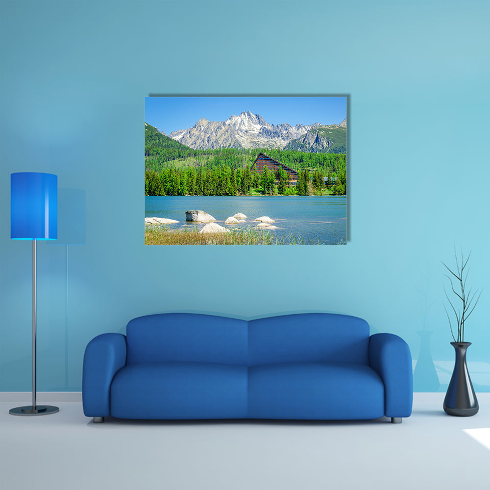 Amazing mountain lake with wooden hotel at the bank multi panel canvas wall art