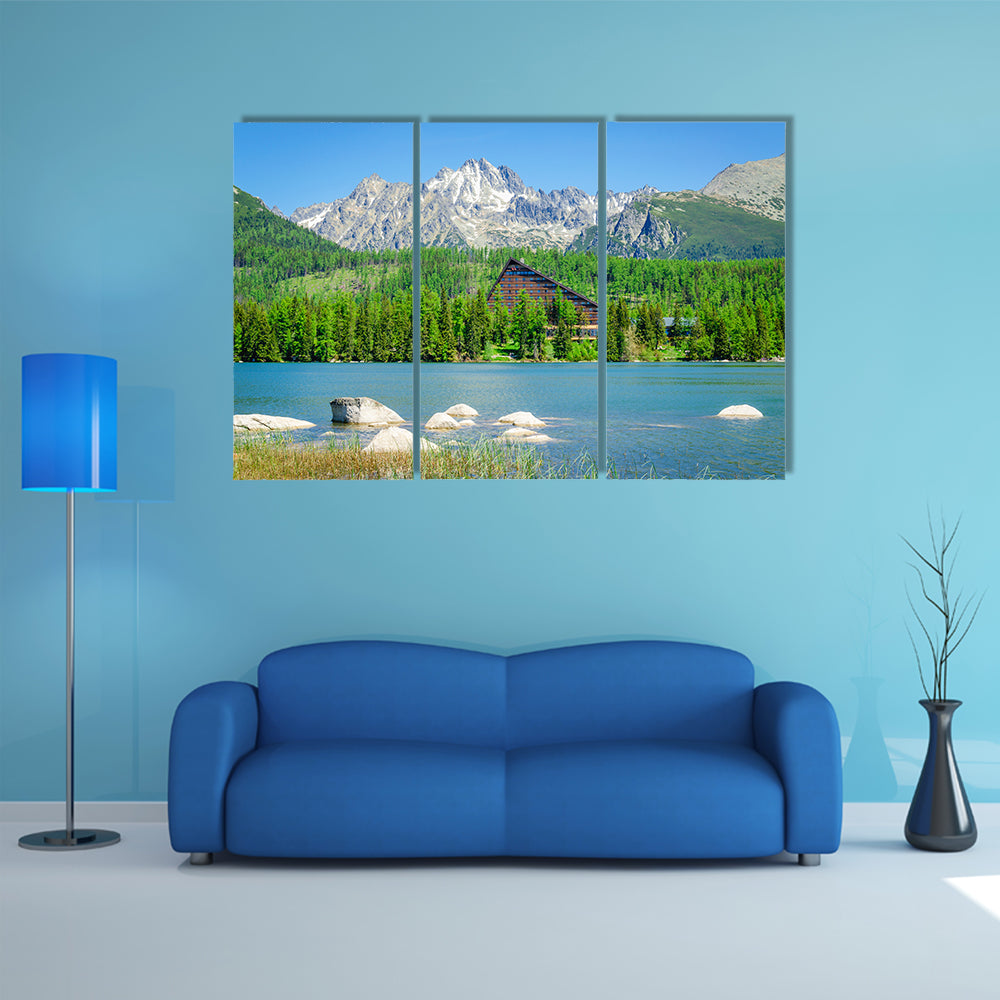 Amazing mountain lake with wooden hotel at the bank multi panel canvas wall art