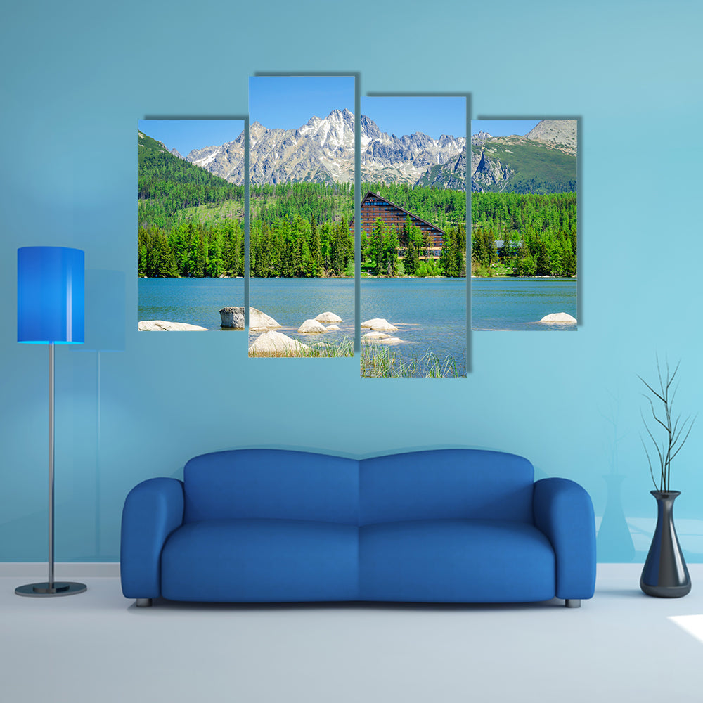 Amazing mountain lake with wooden hotel at the bank multi panel canvas wall art