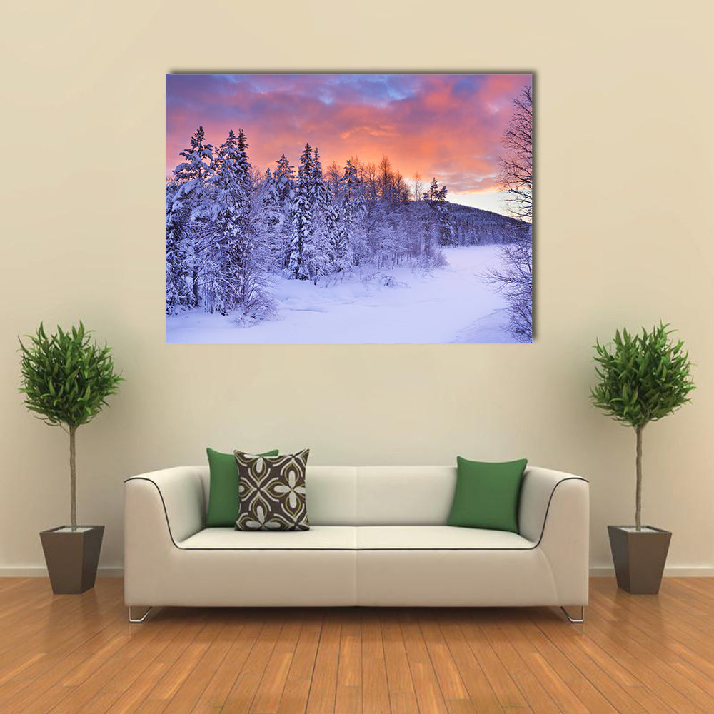 A frozen river in a wintry landscape multi panel canvas wall art