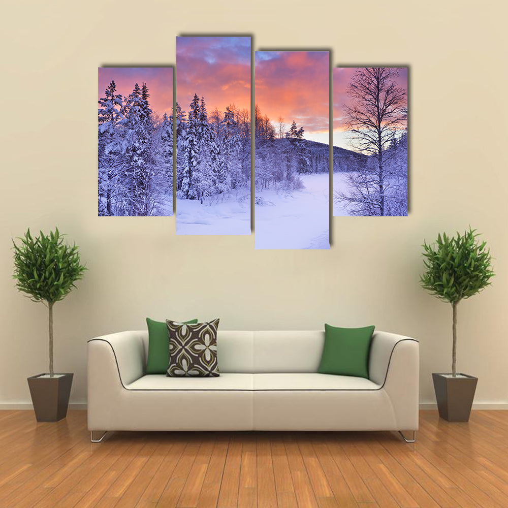 A frozen river in a wintry landscape multi panel canvas wall art