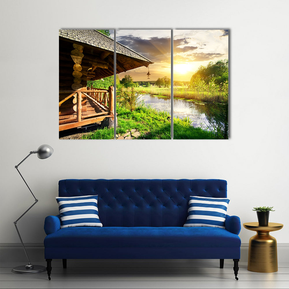 Wooden Bathhouse Near Lake at the Sunset Multi Panel Canvas Wall Art