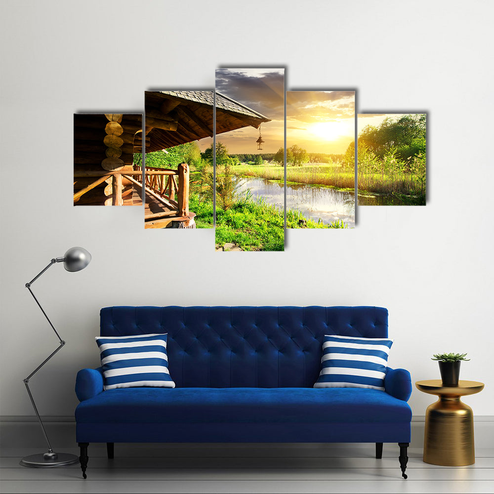 Wooden Bathhouse Near Lake at the Sunset Multi Panel Canvas Wall Art