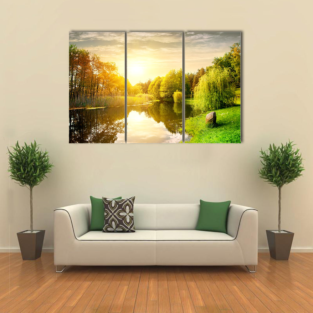 Sunset over calm river in the park multi panel canvas wall art